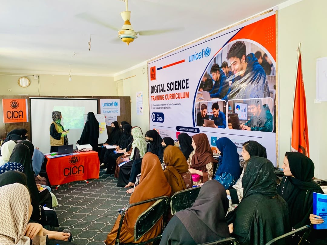 Women participating in Digital Science classroom activities